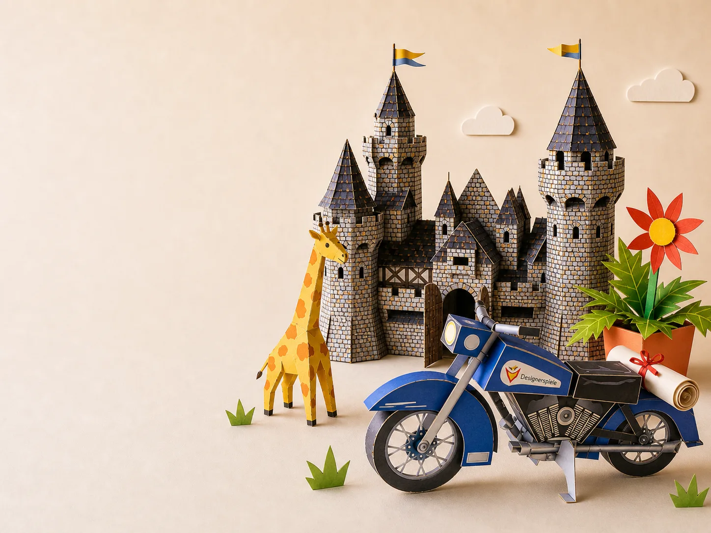 Designerspiele Papierwelt mit Burg, Giraffe, Blume und Motorrad